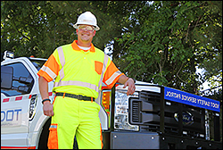 man in hard hat at safety service patrol truck